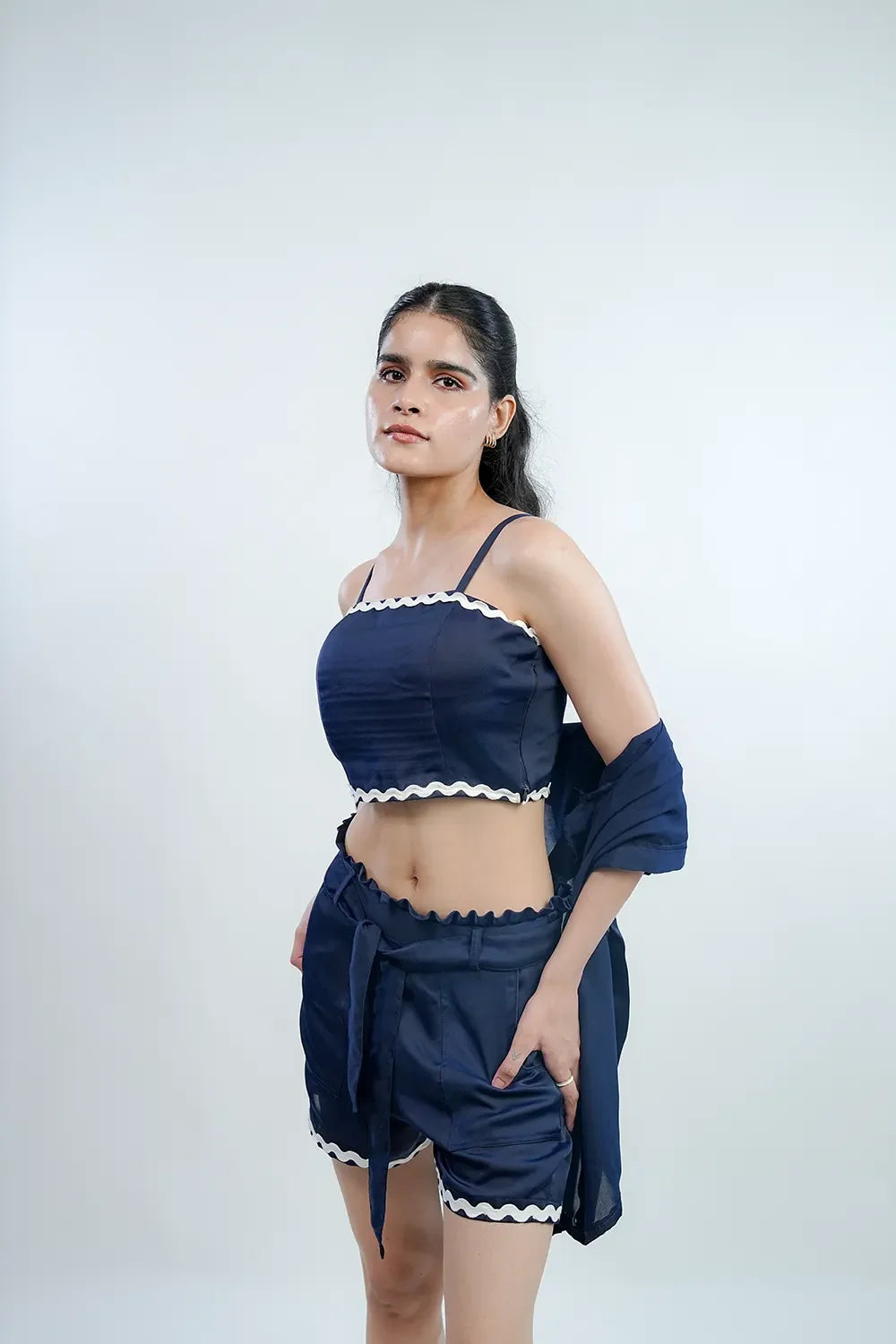 Woman in navy blue co-ord set with white trim, modern summer fashion, Streiq Uniquely You